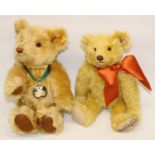 Two Steiff teddy bears: Danbury Mint 2001 bear, and a 2007 musical bear with orange ribbon, max.