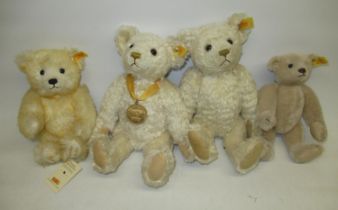 Four assorted Steiff bears including a Millennium Bear, H30cm and a Gemini Bear H22cm (4)