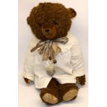 Mid C20th large brown straw filled teddy bear, 62cm