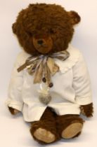Mid C20th large brown straw filled teddy bear, 62cm