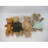 Four early C20th and later British teddy bears, one in a green duffel coat