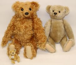 Three Steiff bears: 1997 Collectors Club miniature bear, 1911 replica bear in blonde mohair, and one