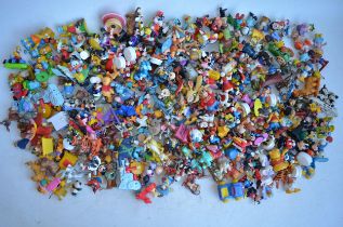 Extensive collection of plastic, metal and ceramic cartoon, fantasy and giveaway figures (Disney,