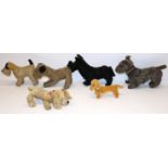 Five vintage toy dogs including a Chiltern golden spaniel, and a modern Steiff dachshund