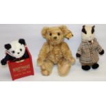 Modern Merrythought soft toys: panda jack-in-the-box; badger from Wind in the Willows; and a