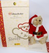 Steiff Christmas Teddy Bear, light blond, 30cm. Limited edition 1147/2000, boxed with certificate