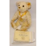Steiff Millennium Bear with gold medallion on yellow ribbon, with COA, H28cm