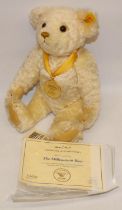 Steiff Millennium Bear with gold medallion on yellow ribbon, with COA, H28cm