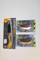 Pair of as new Rosewood handled pruning knives and a Trail Breaker boxed as new pocket knife(3)