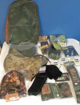 Mixed collection of shooting related items, DVDs. waxed leggings, gun socks, hoods, cartridge belt