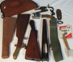 Collection of shooting items inc. 3 wood stocks, fore end, oil bottle, trigger guard, hammers, etc.
