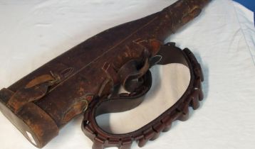 Vintage leather Leg of Mutton gun case and an unusual 50 loop leather and brass buckle cartridge