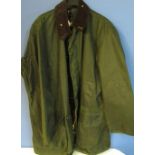 As new Barbour 'Northumbria', Olive. Size 50. Tin of Barbour wax