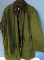 As new Barbour 'Northumbria', Olive. Size 50. Tin of Barbour wax