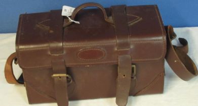 Leather cartridge case with hinged lid, carrying handle and shoulder strap. 34cm x 200cm x 14cm