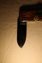 Pair of Franklin Mint John Deere single bladed pocket knives in own cases and a Antler handled