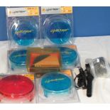 Collection of seven LightForce light filters, blue and red and a hand held Clulite lamp