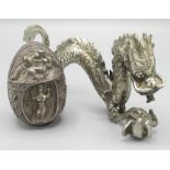 C20th Cypriot/Greek white metal decorative egg ornament, decorated in relief with mythical scenes