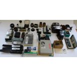Selection of miniature cameras and selection of camera lenses, accessories, filters, light meters,