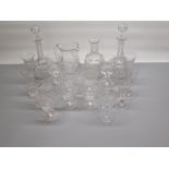 Pair of glass decanters, another decanter (missing stopper), water jug and a collection of