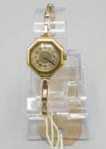 C20th Swiss ladies 18ct gold hand wound wristwatch on expanding rolled gold bracelet, gold