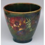 Moorcroft Pottery: Anemone pattern cache pot, tubelined lustre decoration of red flowers on dark