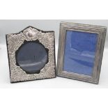 ERII embossed silver photograph frame with circular aperture, London 1989 H21.5cm and another