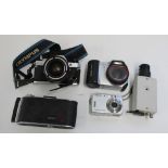 Olympus OM 10 camera with 28-70mm lens, Phillips VMC 7650 CCTV camera, Agfa Billy record folding