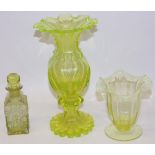 Three pieces of C19th uranium glass, comprising two vases and a hobnail scent bottle, max. H25cm