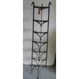 Vintage seven tier painted wrought metal tapering pan stand, H137cm