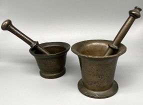 Two C19th style patinated brass apothecary mortars and pestles