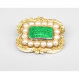 Will. IV yellow metal shaped rectangular brooch set with green enamel panel surrounded by a pearl