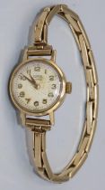 Tudor Royal - lady's 9ct gold hand wound wristwatch, signed champagne Arabic dial with two piece
