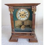 C19th mantel clock twin train keywind movement striking on s gong, stained pine case with applied
