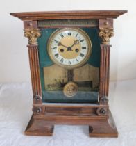 C19th mantel clock twin train keywind movement striking on s gong, stained pine case with applied