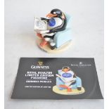 Royal Doulton MCL22 limited edition "Guinness Penguin" ceramic figurine (204/950) in slightly