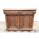 Edw. VII Gothic revival oak side cabinet, moulded top over two frieze drawers and two panelled doors