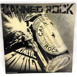Canned Rock 'Kinetic Energy', with 2 band members signatures