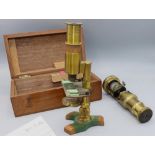 Two early C20th lacquered students brass microscopes, one with original fitted mahogany box, H18.5cm