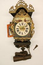C20th Dutch style wall clock alarm with applied cast brass mounts, painted Roman dial, the two train