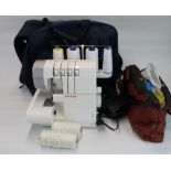 Singer Overlocker 14SH754 Sewing Machine in carry bag with accessories