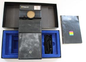 Polaroid SLR 680 instant film camera in original box