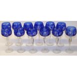 C20th twelve Bohemian lead crystal hock glasses with blue overlay and incised cut decoration