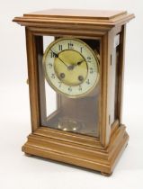 Early C20th mahogany four glass mantle clock, the dial having a matted centre and raised outer