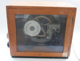 Mid C20th Gents of Leicester Pulsynetic Impulse Timer, Serial No. NU113379, in glazed beech case,