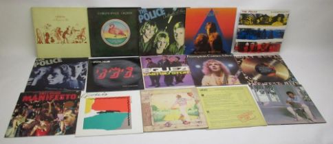 Large Collection of vinyl 12" LPs and 45 RPMs covering Rock & Pop, inc. Elton John, Queen,