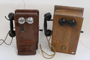 Early to mid C20th hand crank operated wall mounted wooden telephone boxes, max H42cm (2)