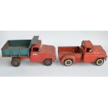 Two vintage pressed steel pick up truck models to include a Tonka Toys dump truck (in working order)
