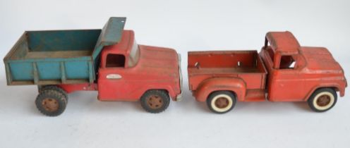 Two vintage pressed steel pick up truck models to include a Tonka Toys dump truck (in working order)