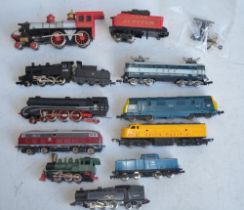 Collection of N gauge electric train models and a Bachmann HO gauge Jupiter. Some damage to